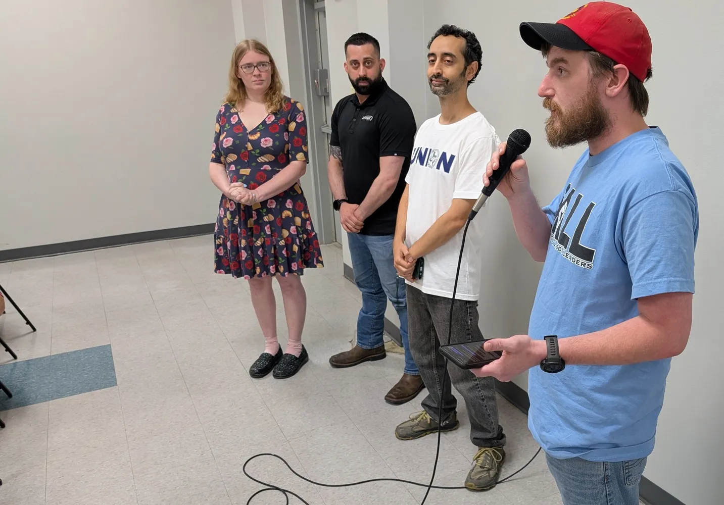 Derrick Moran of UAW 848 and other young leaders make reports